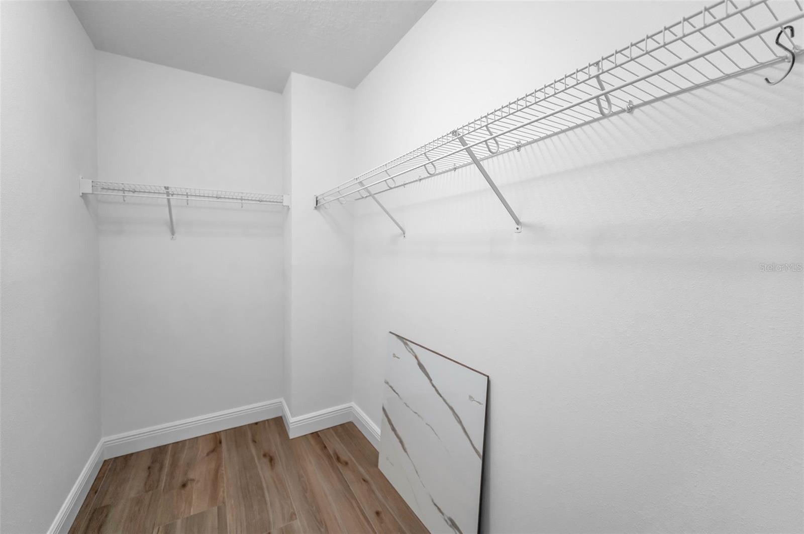 .. Bedroom # 2  Walk In Closet. This Unit with Over 3000 Sq FT has Ample Closet Space Everywhere. .. New Floors - New Wall Finish. New Trim.