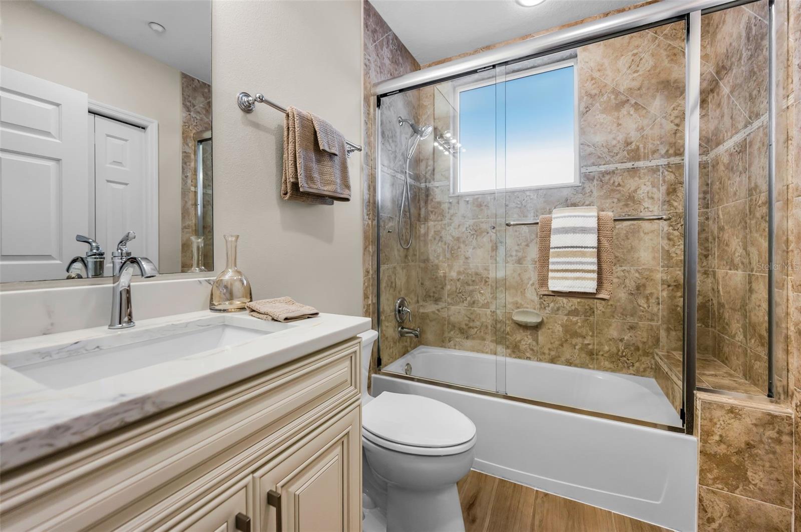 ..Bedroom Number 3 or Primary Guest Suite Complete With Full Bath and Large Walk in Closet .
