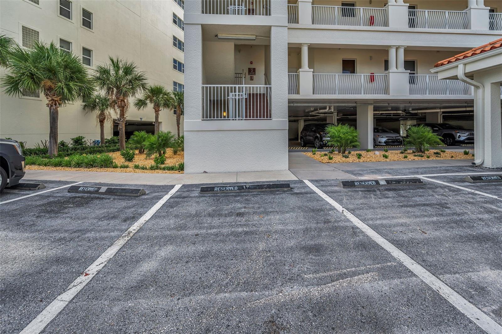 .. Residence # 202 Conveys with Two Parking Spots.. Number 15 Under the Building and #37 Outside Near The Lobby. Additionally, There is a Generous Amount of Guest Parking. Here We Have Assigned Spot # 37..