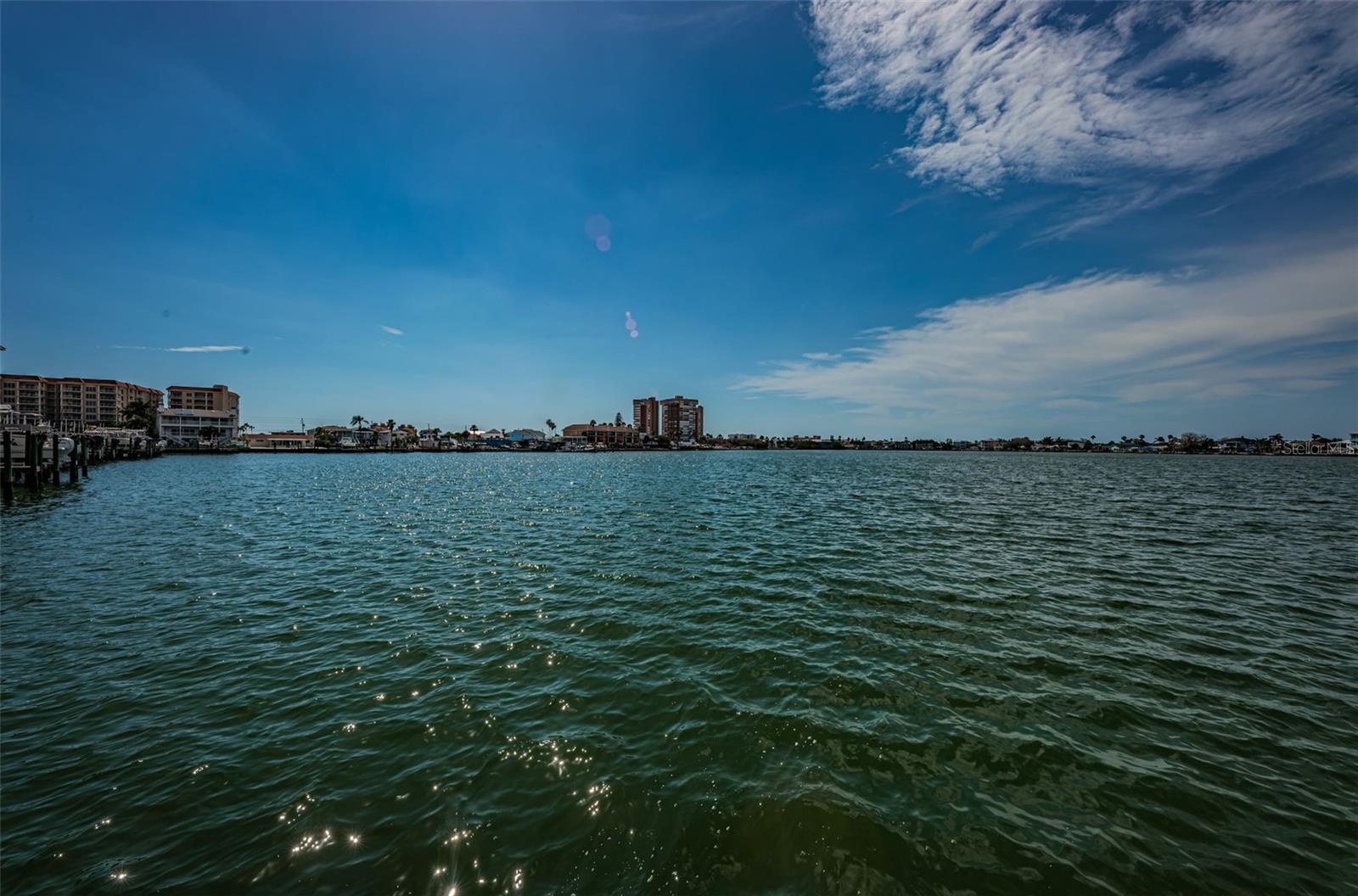 . Nice Shot of Boca Ciega Bay. Redington Shores Yacht & Tennis Club is on The Left in Photo. The Beach or The ' Gulf of America ' is Right Behind The 3 Tall Condo Buildings Straight Ahead in Photo.