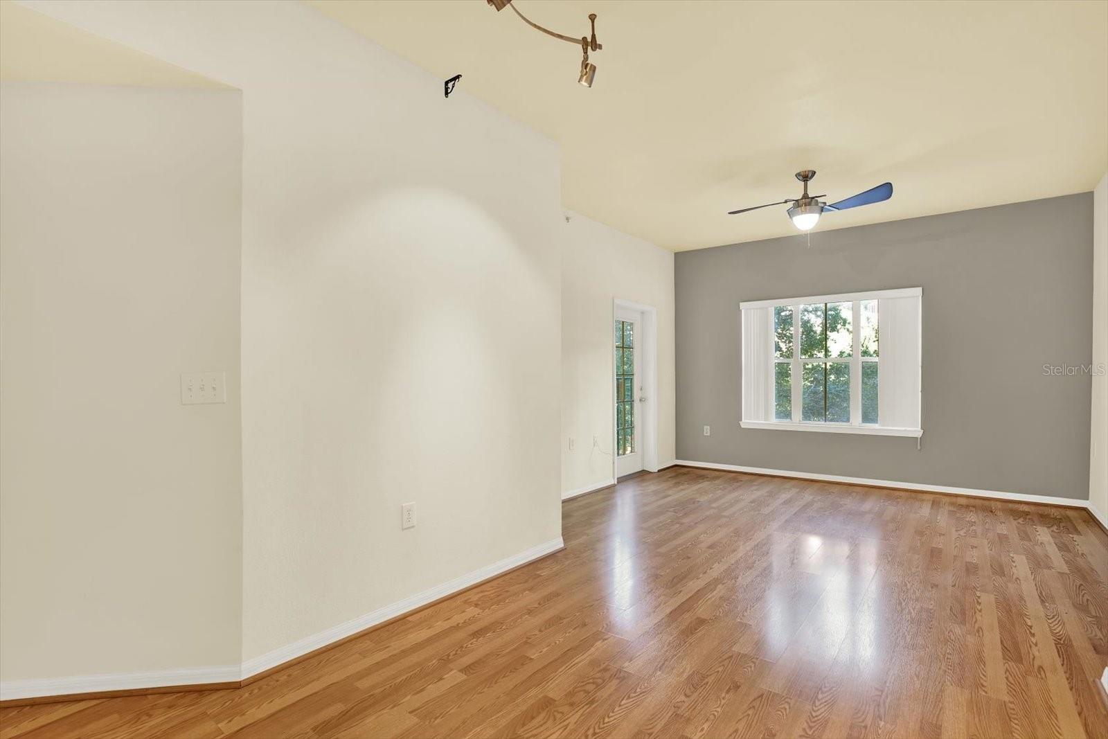 Living Area w/ Access to Private Balcony