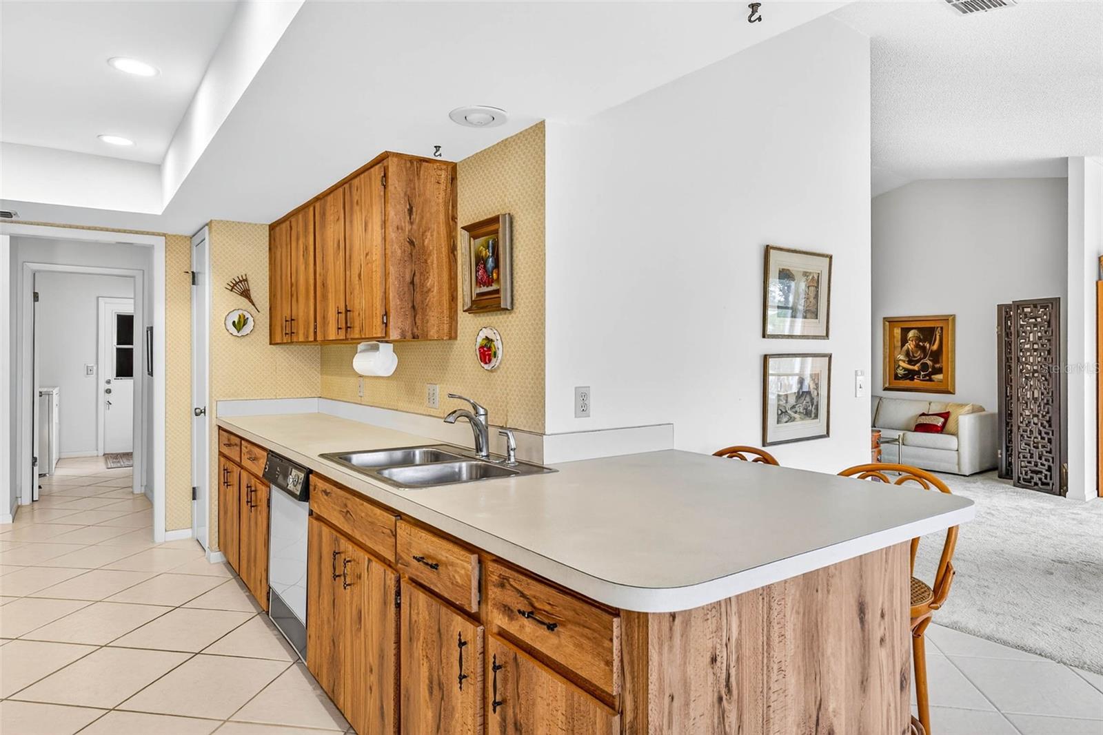eating bar at end of kitchen