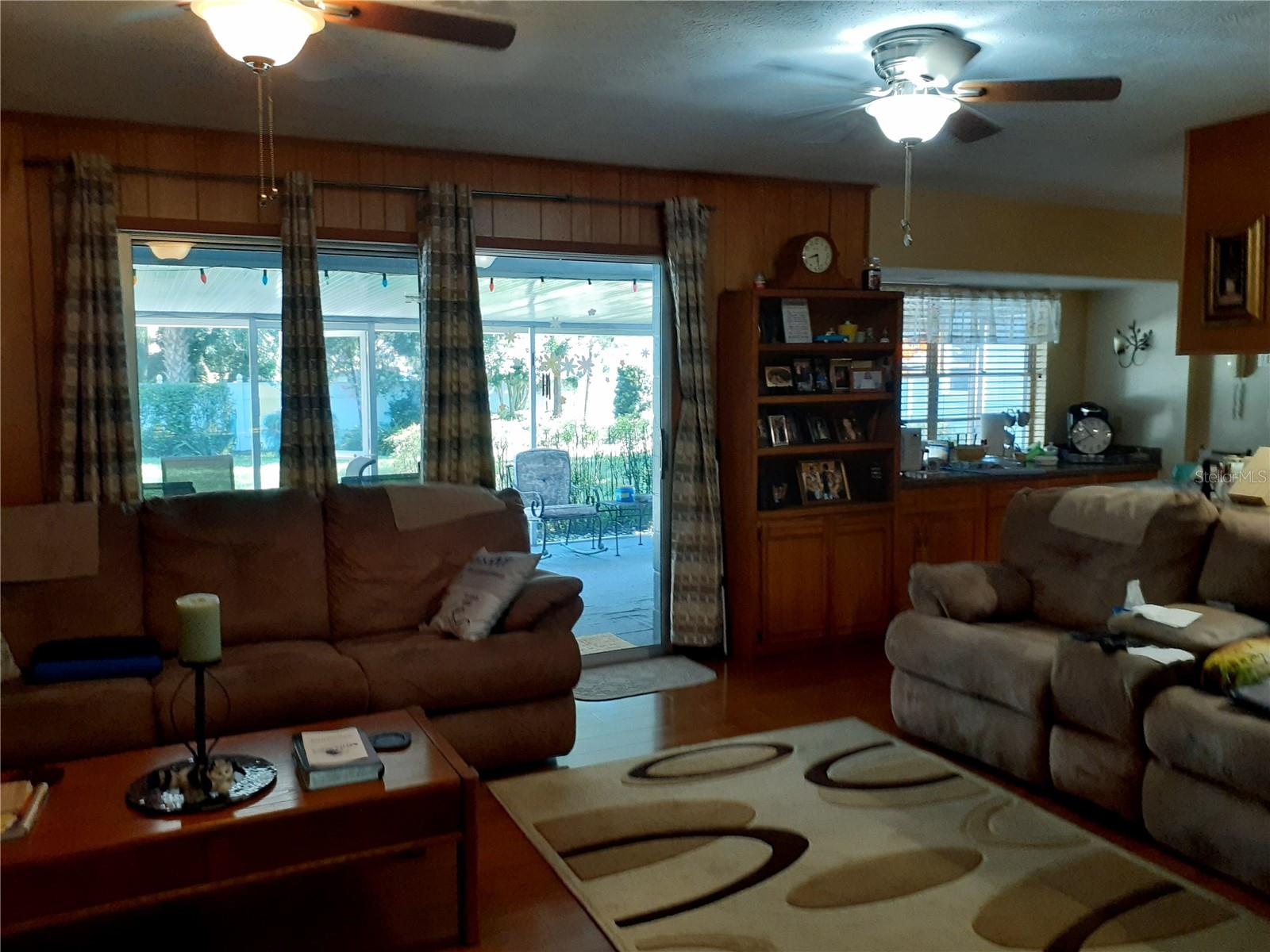 Family Room with slider to lanai and pool