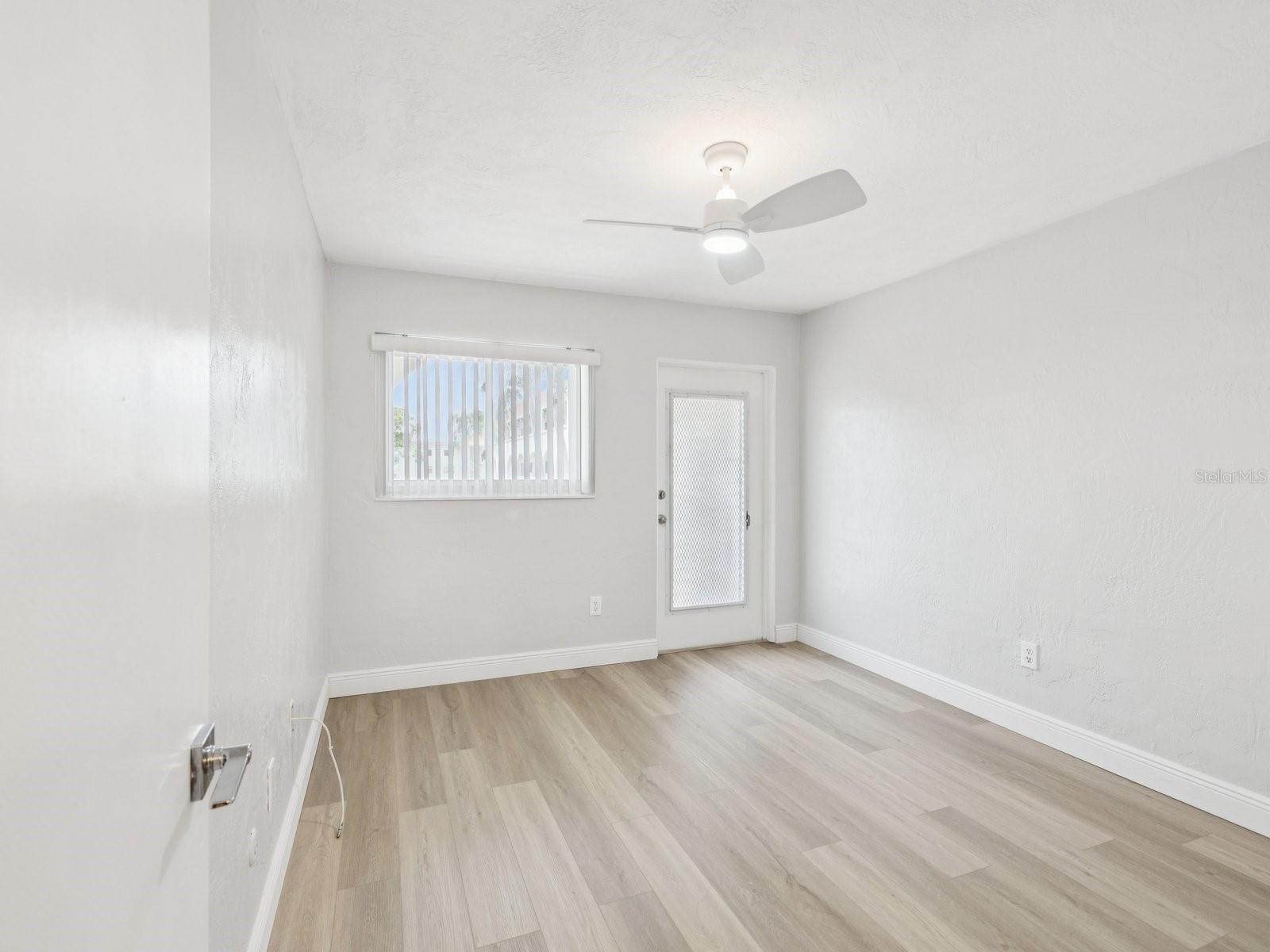 Guest bedroom 1 with separate entry to front balcony