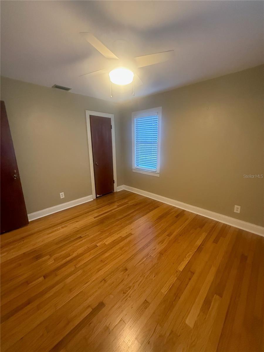 Primary bedroom with deep closets and tons of light