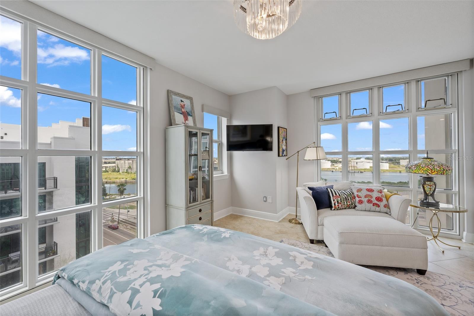 Begin and end your day with expansive water views from your bed