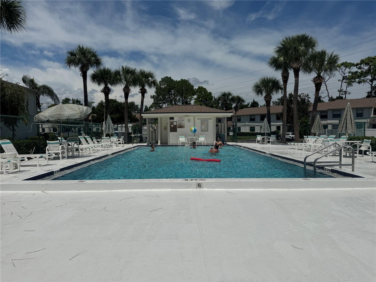 The community pool is just down the sidewalk!