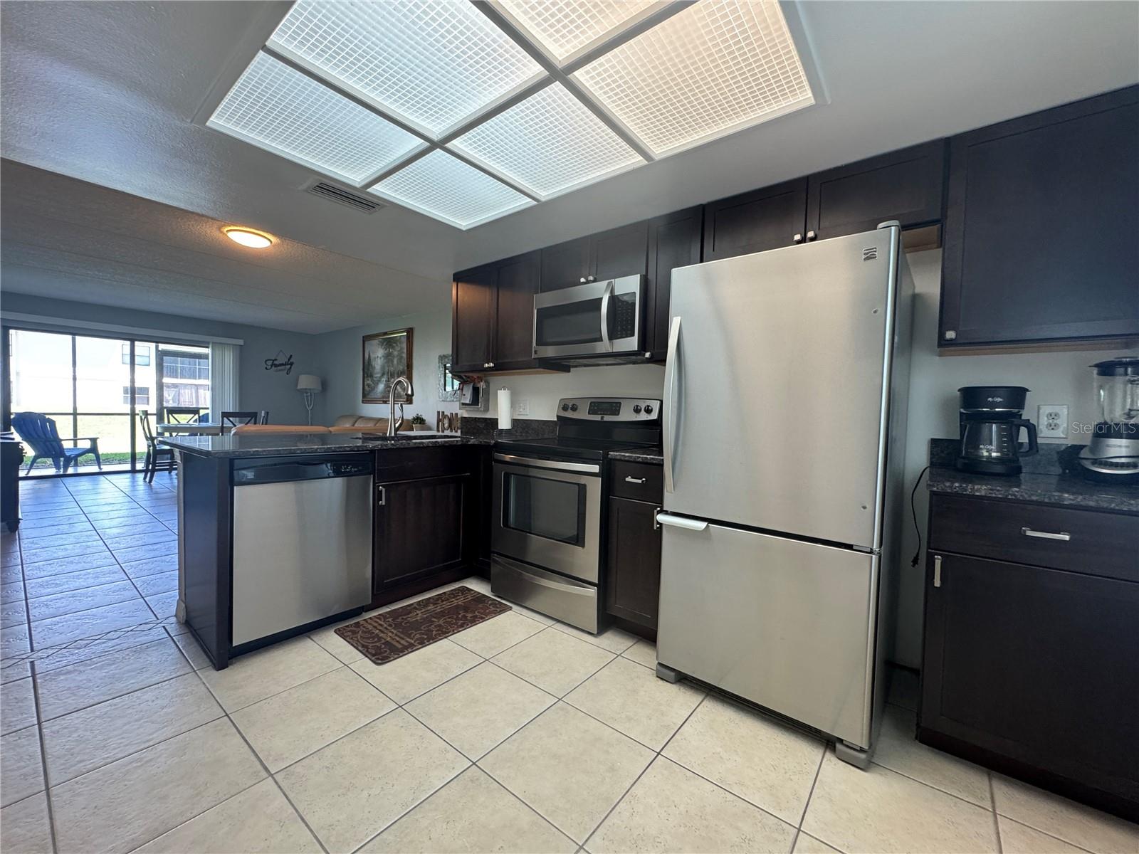 Kitchen with granite countertops and loads of storage!