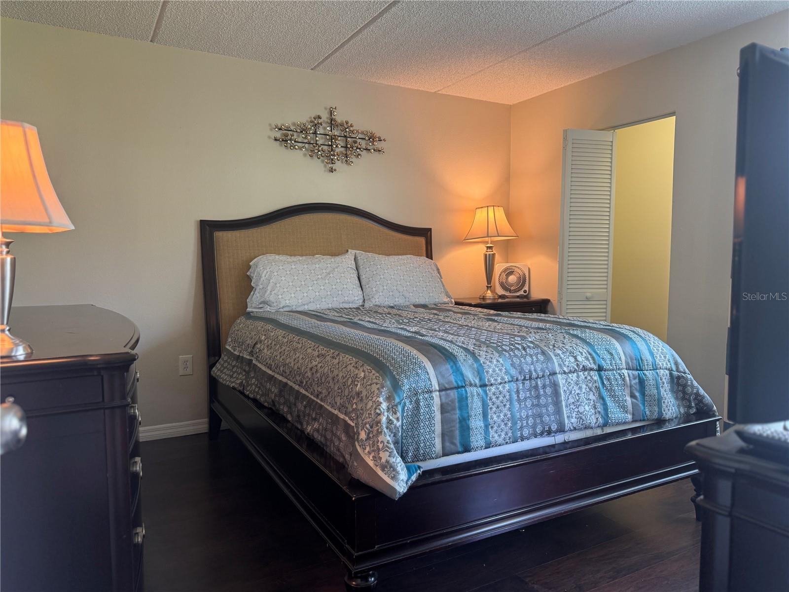 Primary bedroom with 2 walk-in closets and an ensuite bathroom.