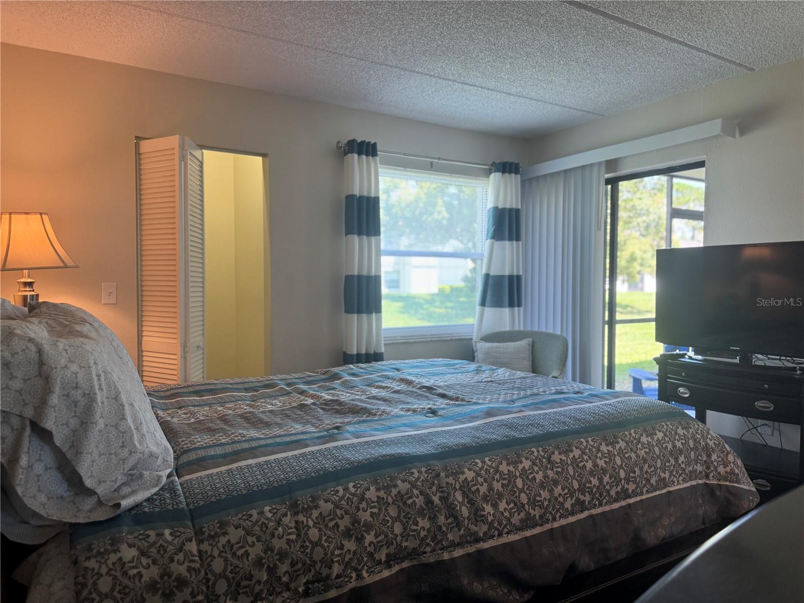 Primary bedroom with 2 walk-in closets and an ensuite bathroom.