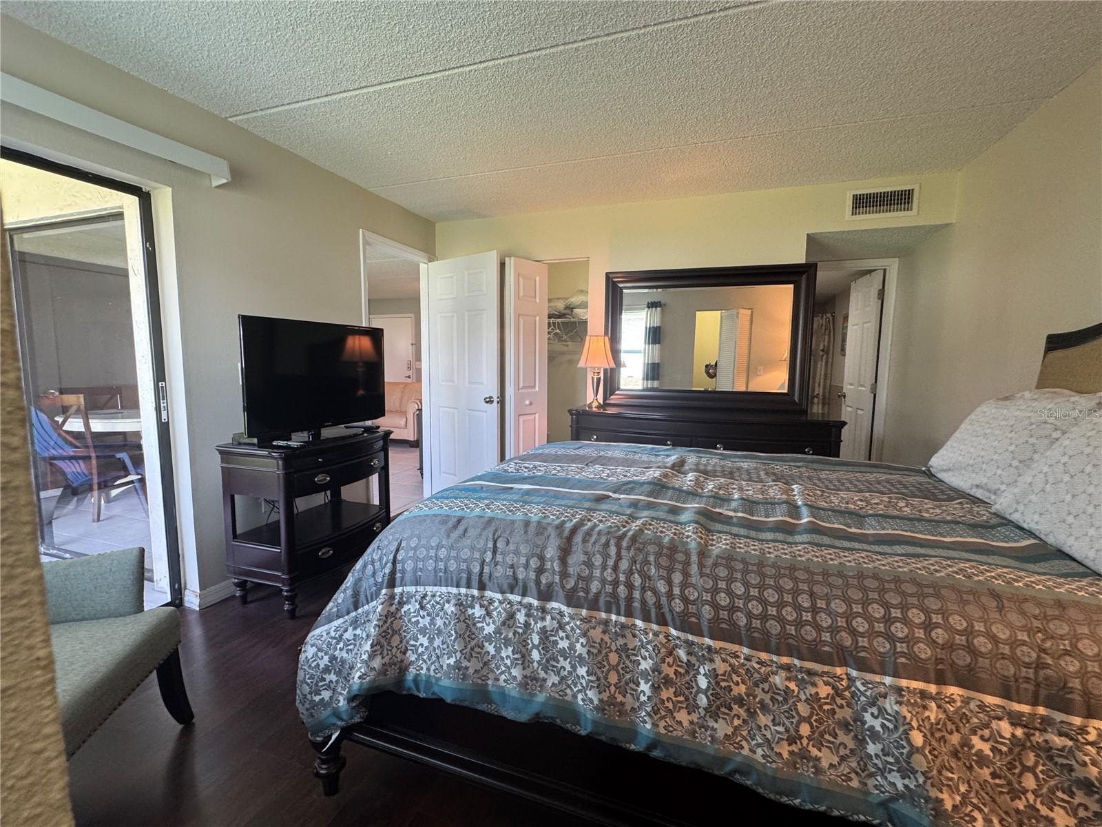 Primary bedroom with 2 walk-in closets and an ensuite bathroom.