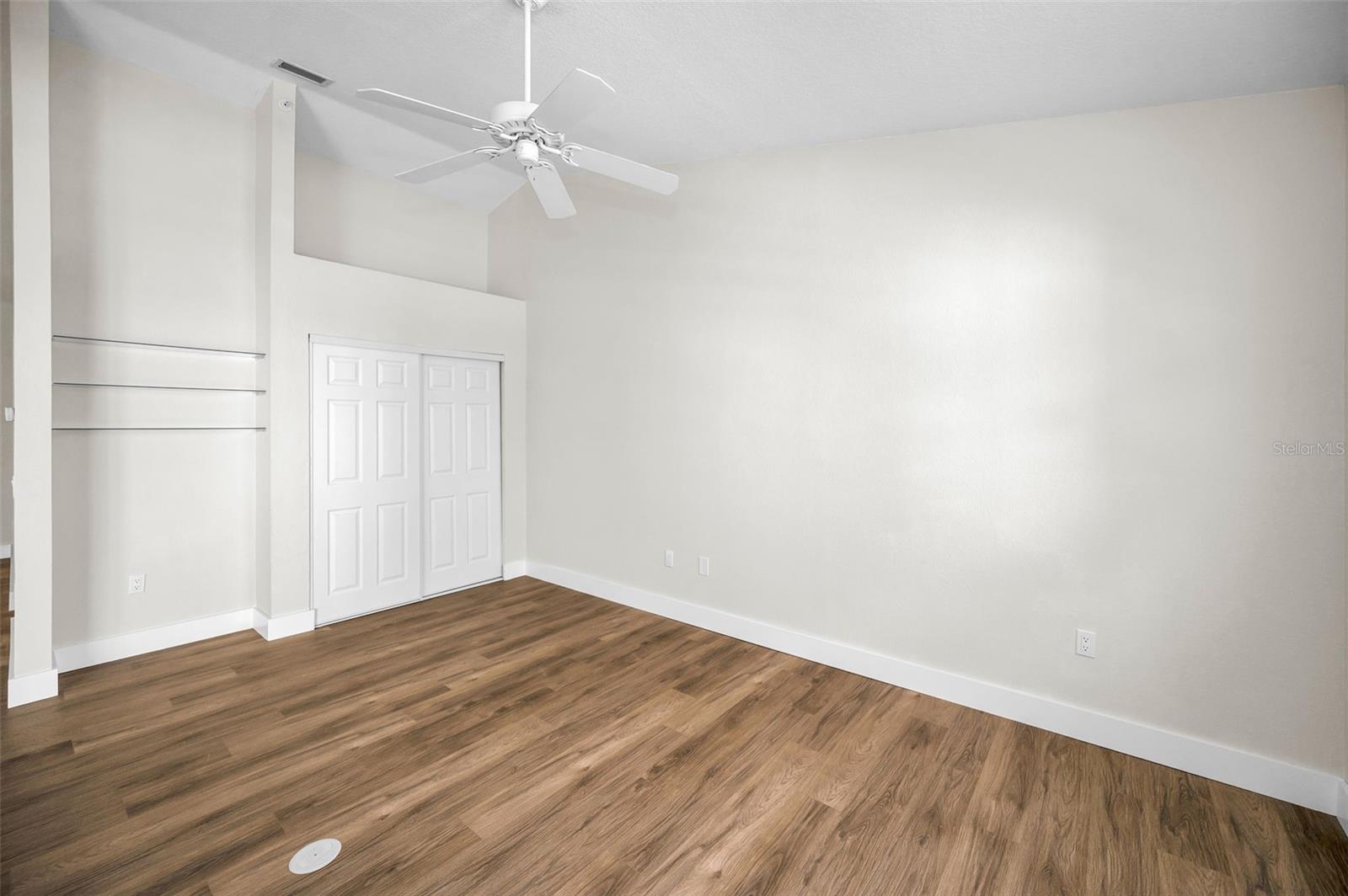 Expanded area of Living Room/Great Room (with closet and  glass shelving built-in)
