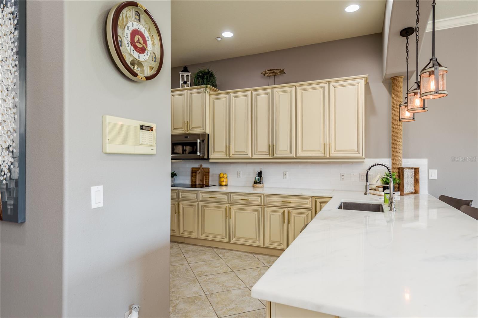 Upgraded and Sparkling Marble Countertops w/ TONS of Custom Cabinetry