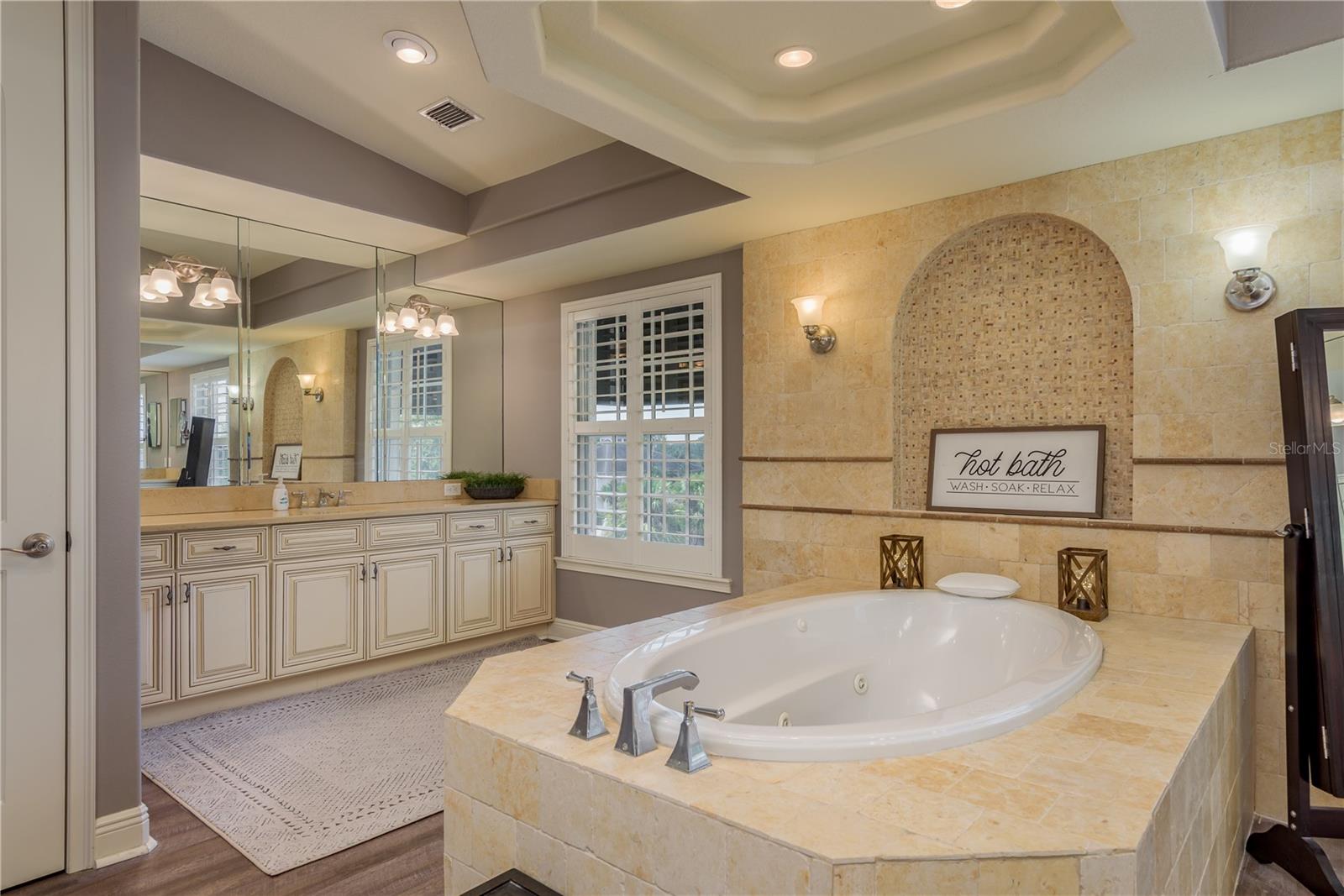 True Split Vanities with massive soaker tub