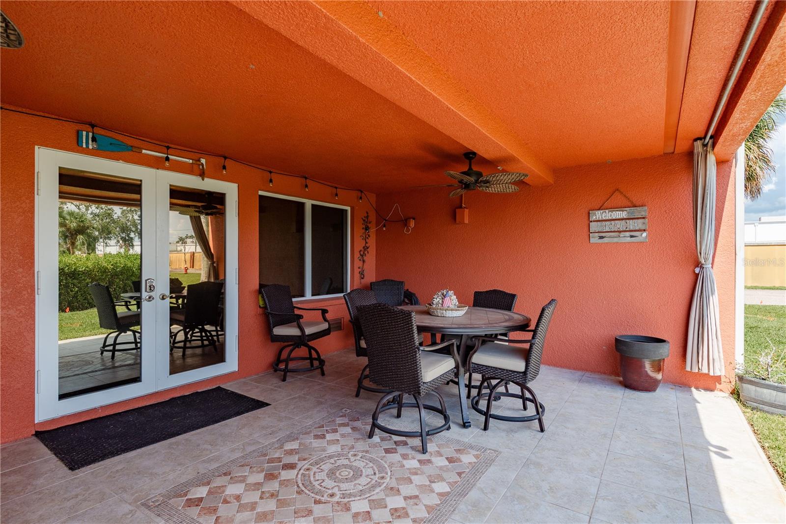 Ground Floor Patio with custom tile inlay