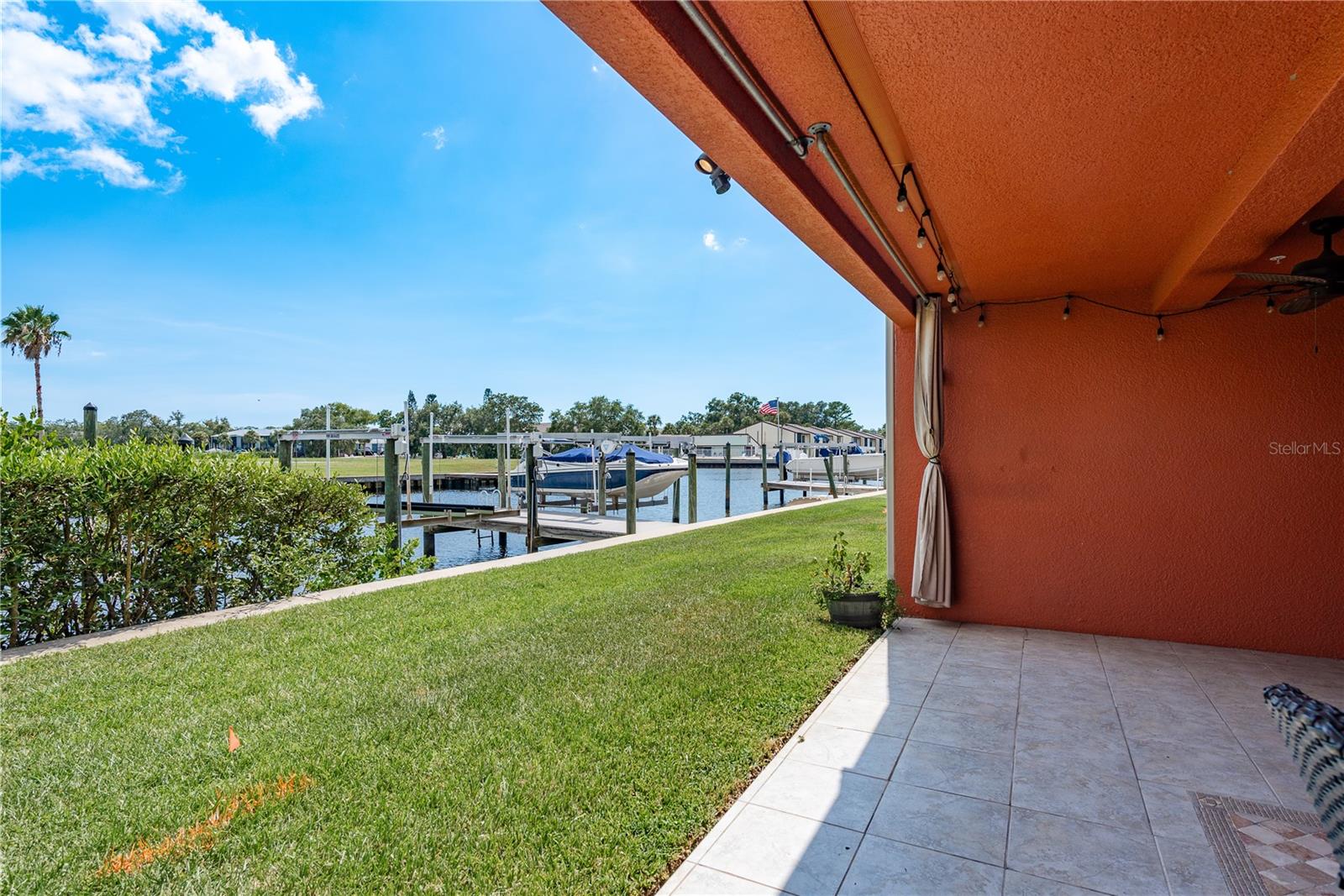 View of your dock with boat lift steps from your back door!