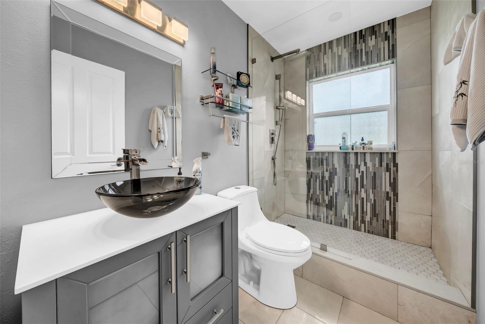 2nd bathroom, located in between 2nd and 3rd bathroom