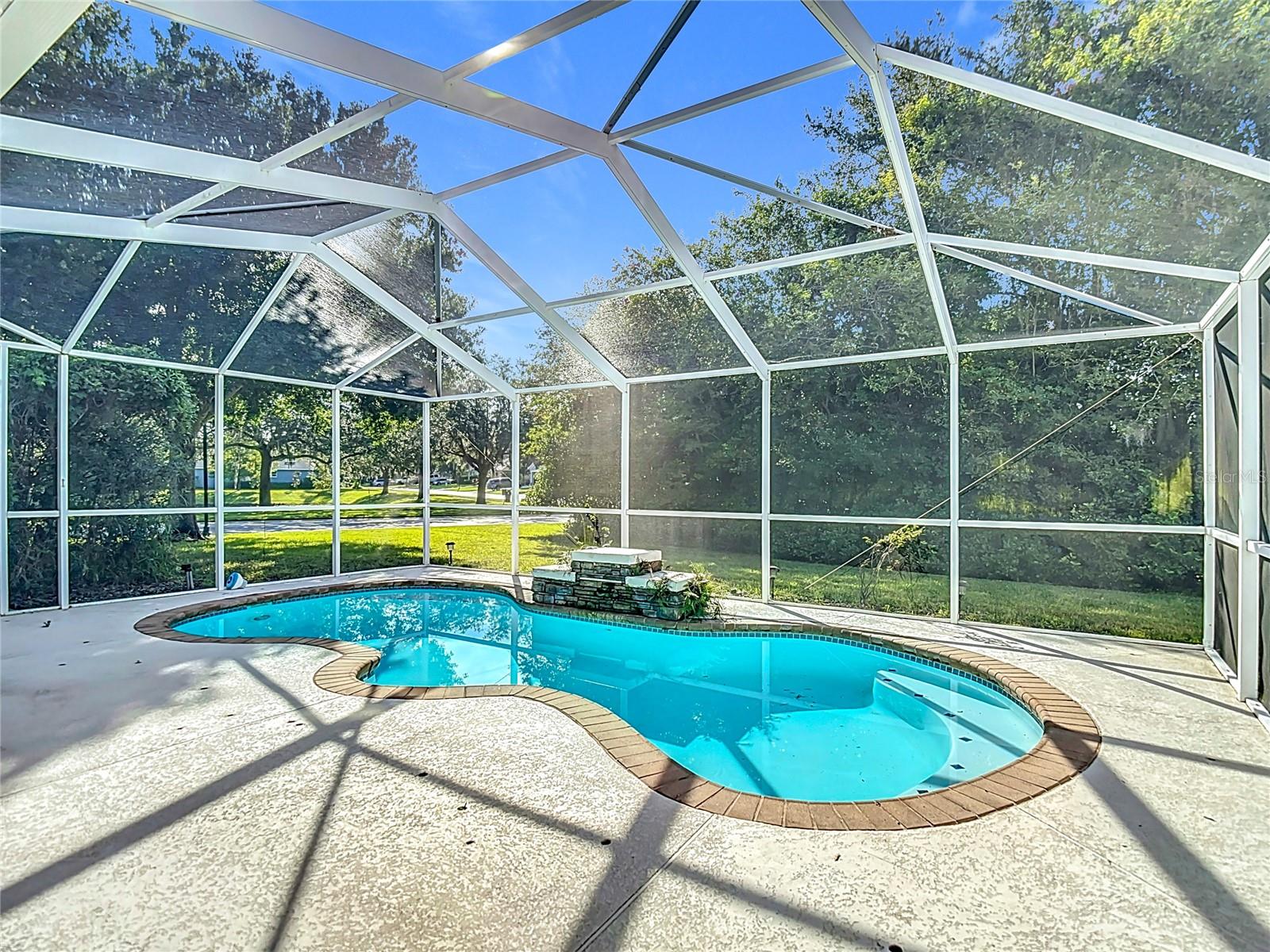 Pool with waterfall