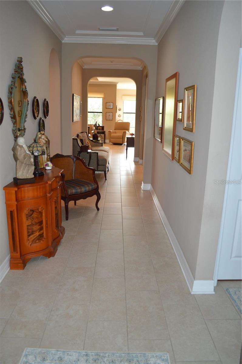 Hallway into the house seen from the front door entrance.