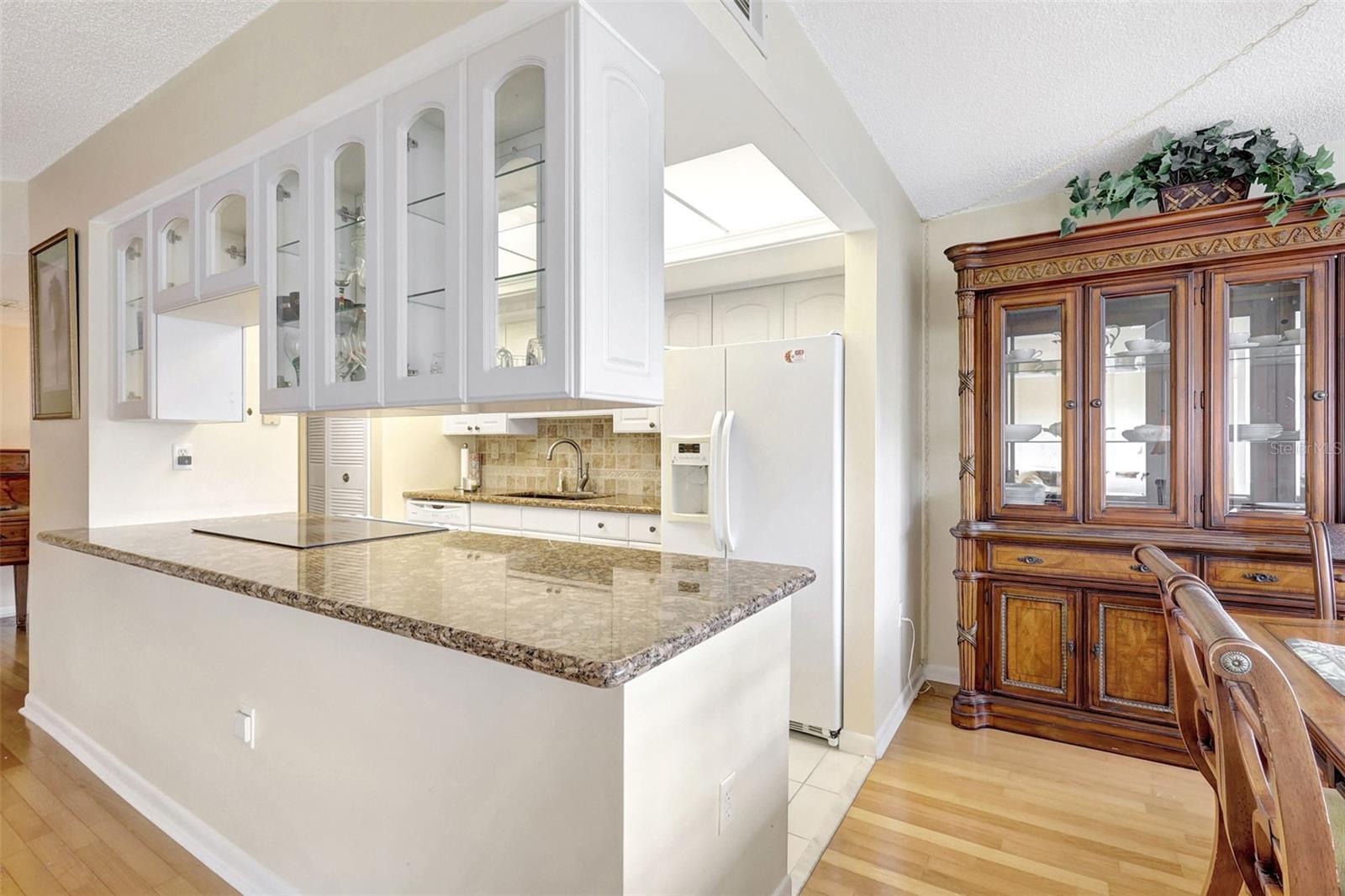 Kitchen has lots of space and has direct access to the dining room