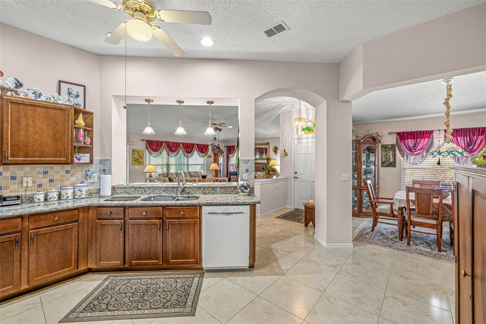 Open from Kitchen to Dining area to living room.  True open concept!