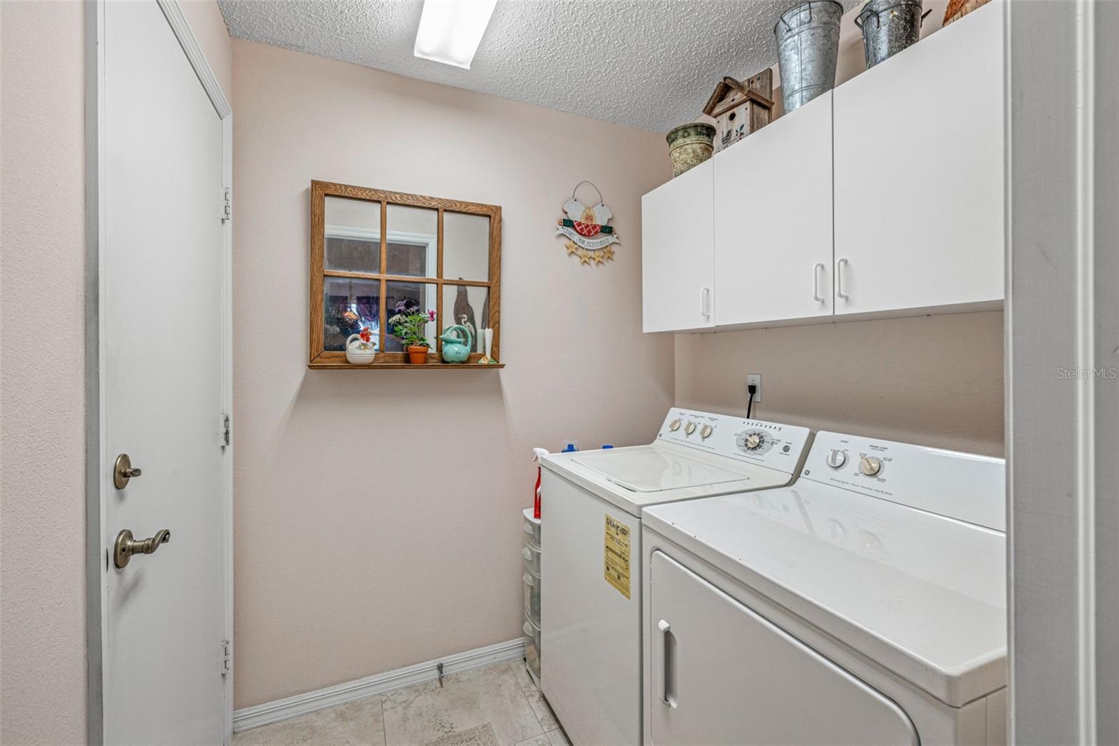 Inside laundry room with extra storage