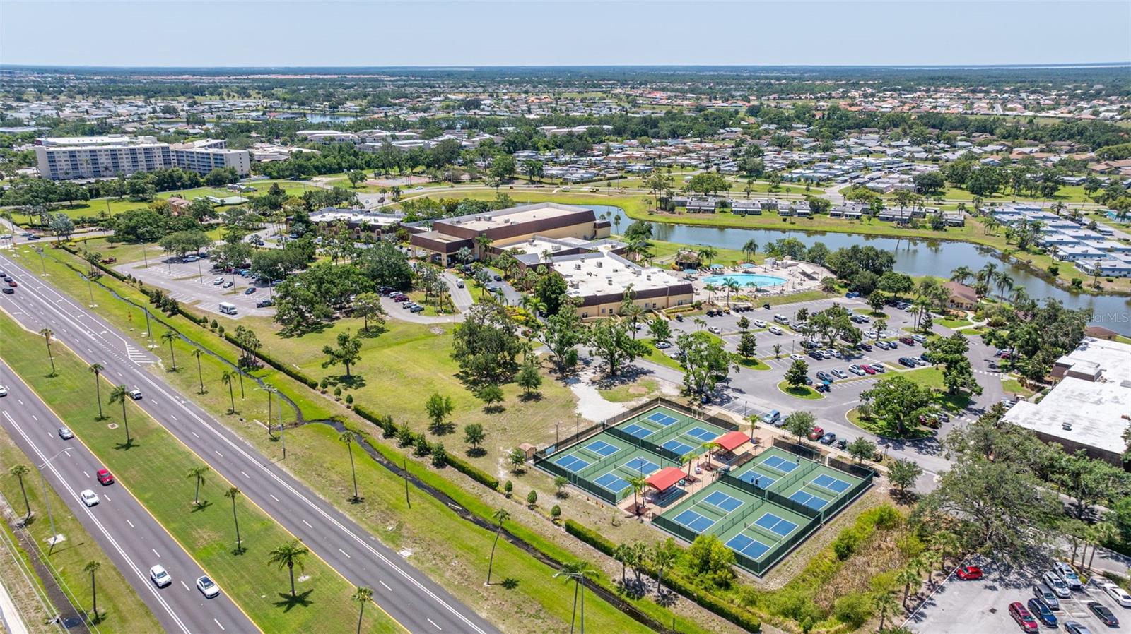 North clubhouse, pool, pickleball complex and fitness center building