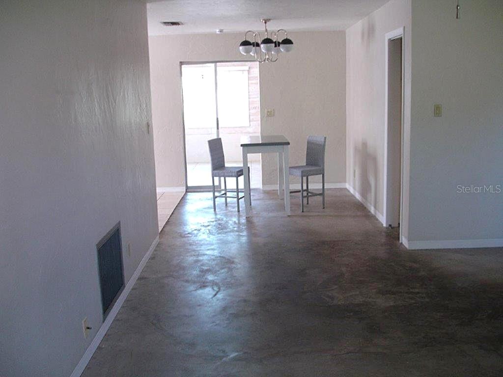 Living room/dining room combo-chocolate concrete floors