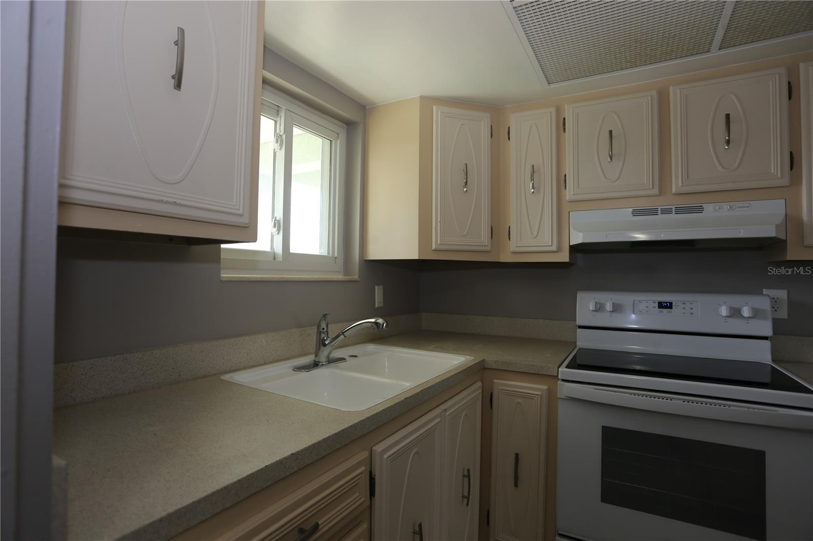 Cream color decorative cabinetry.