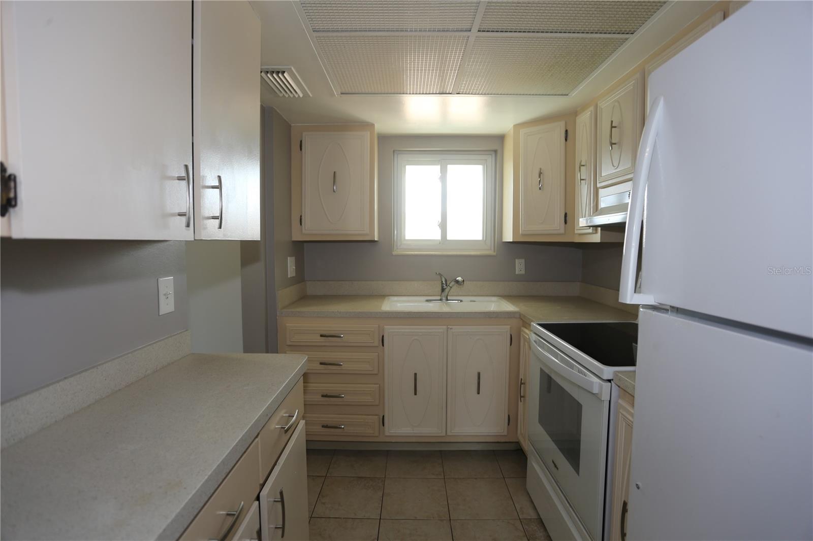 Light an bright kitchen with extra storage,