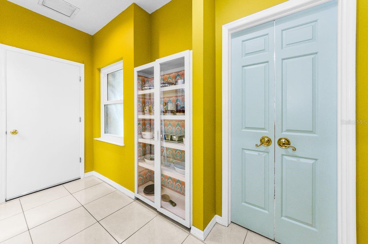 Back hallway Butler's pantry, dining room entry and laundry room adjacent.