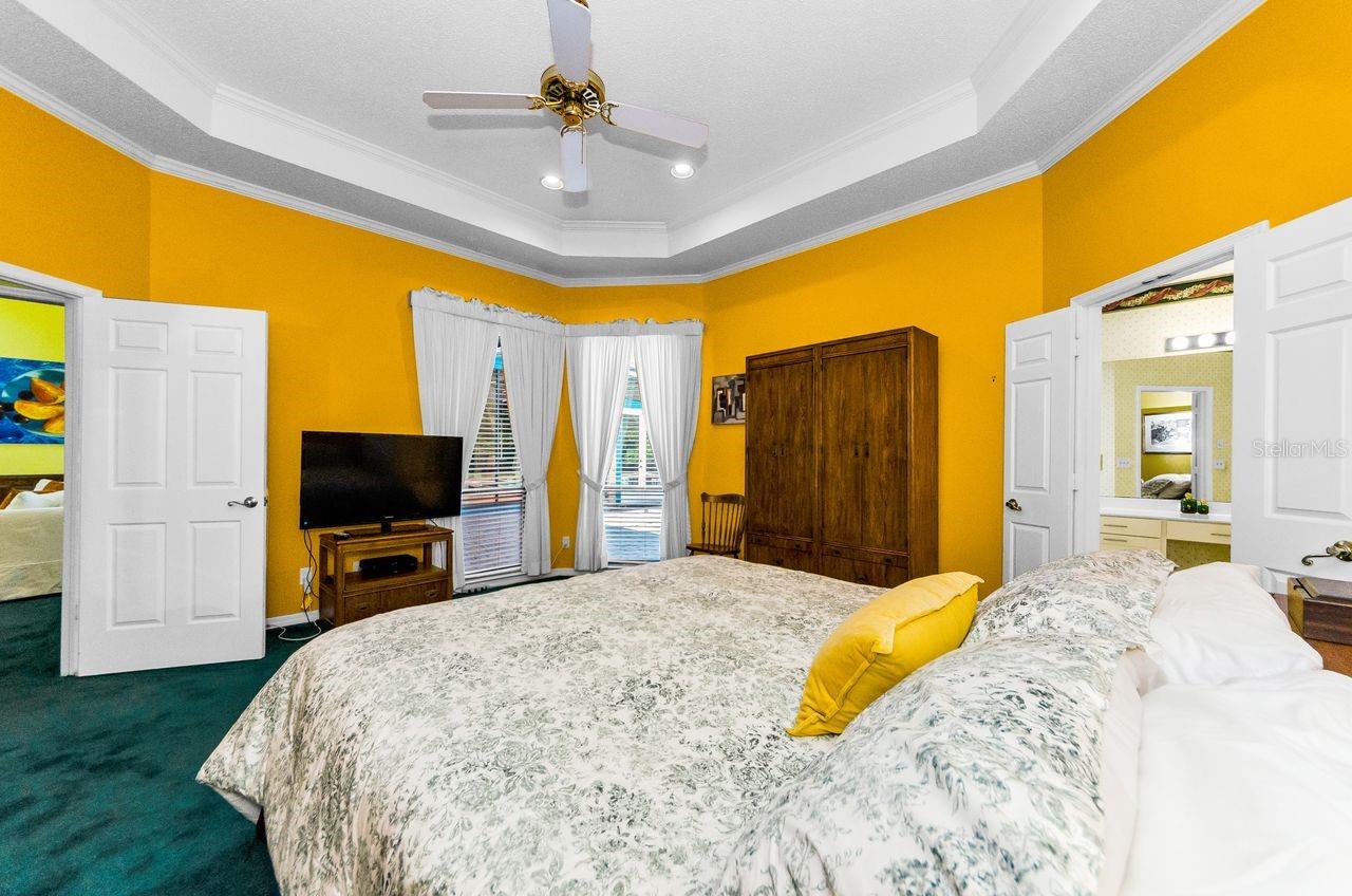 Elegant master bedroom with tray ceiling!