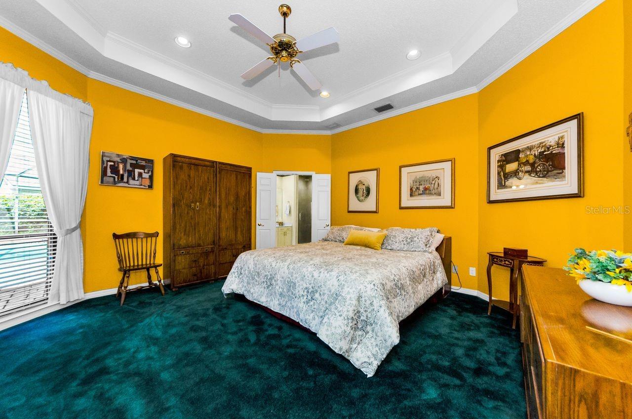 French doors open to the ensuite bath with double vanities, walk in shower and soaking tub and huge walk in closet!