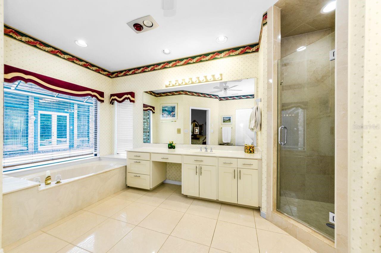 Master bath, ladies vanity and walk in shower. So much space to add your personal taste!