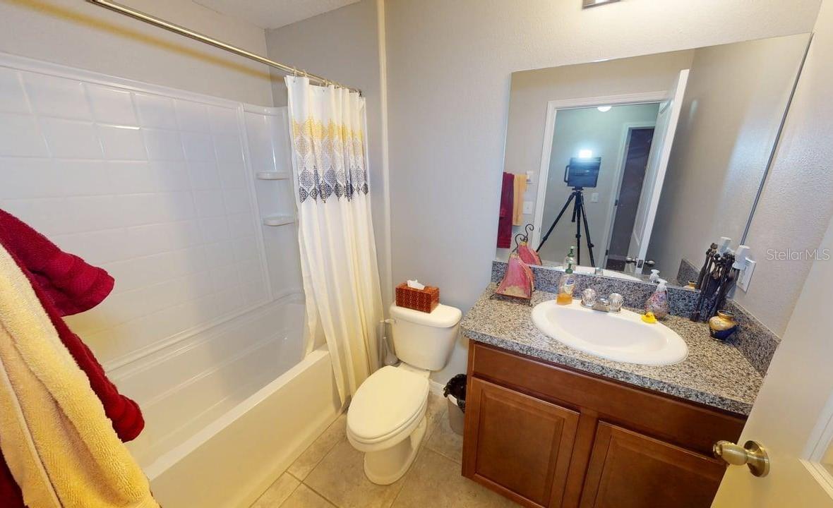 Main bath located by secondary bedrooms
