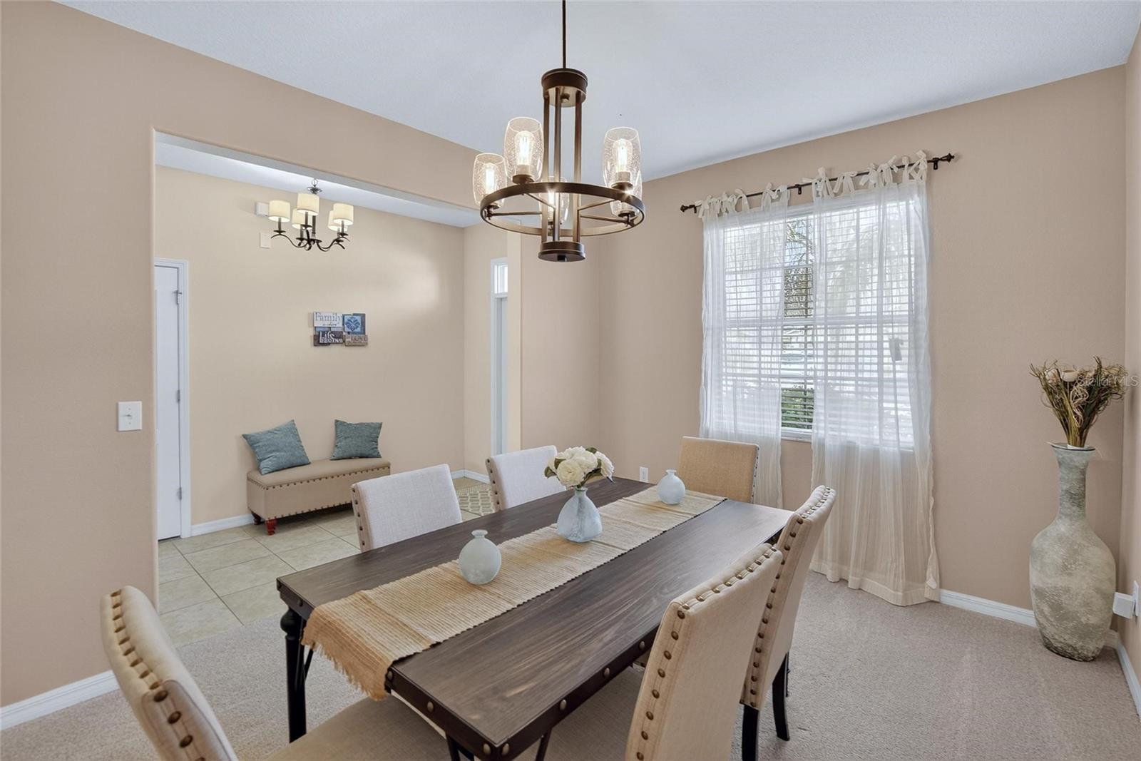 Formal dining facing foyer