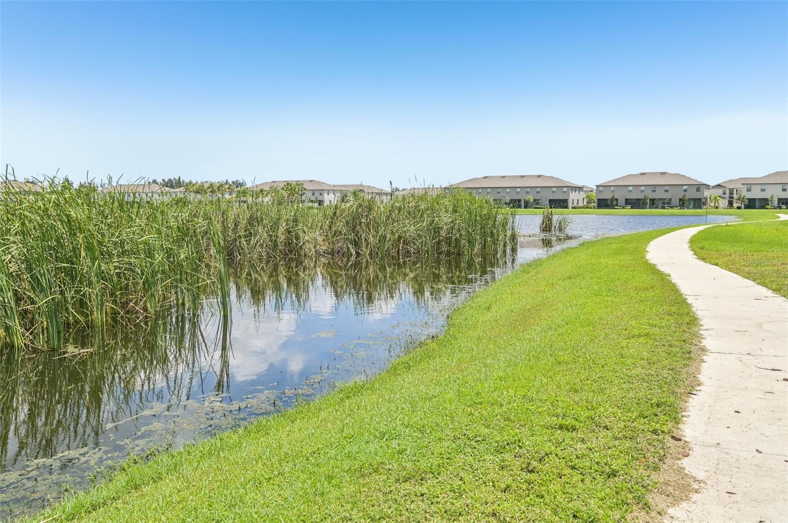 Direct access to the walking path overlooking the water