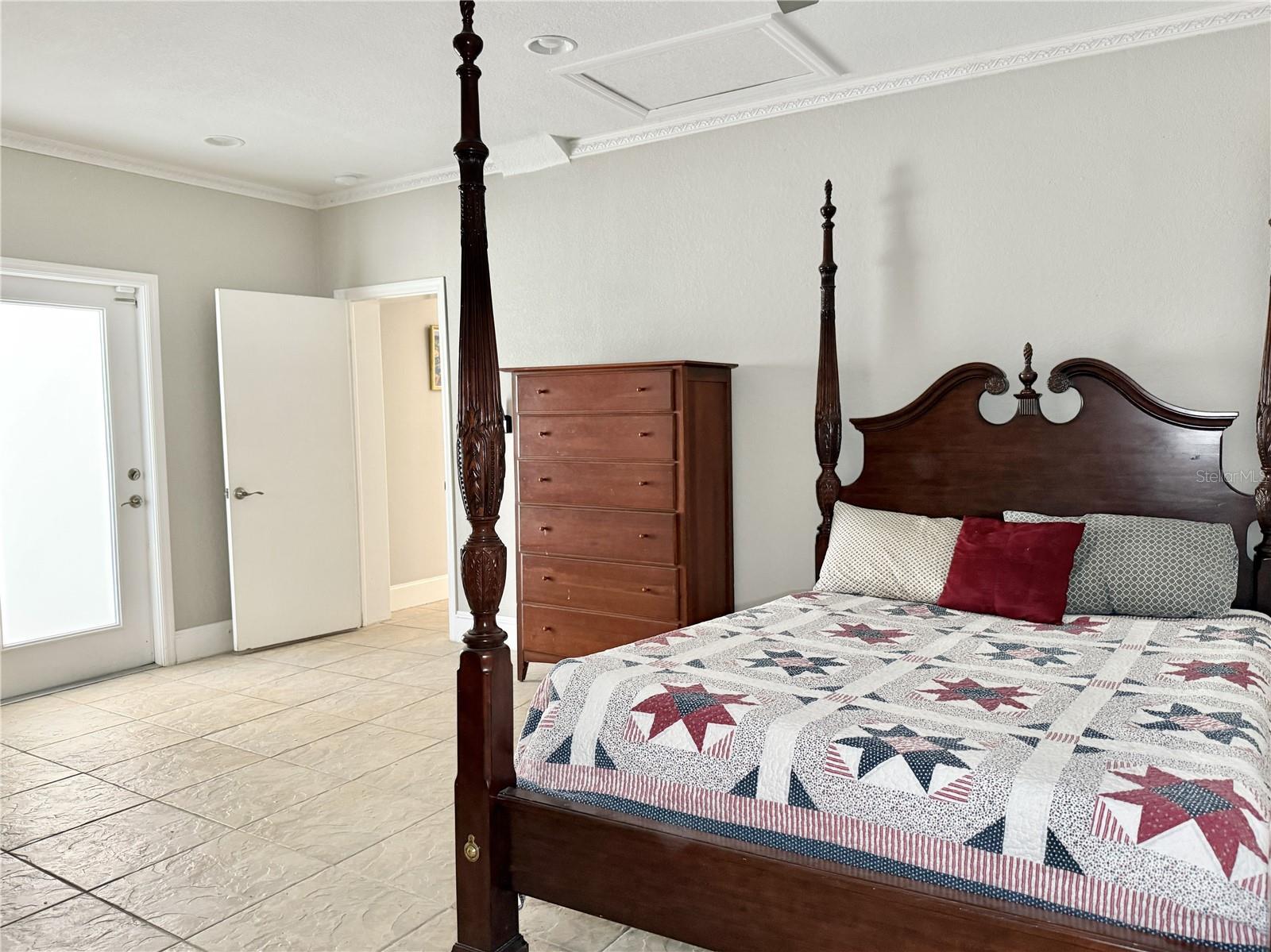 Primary Bedroom - Walk-In Closet with Built-In Shelving