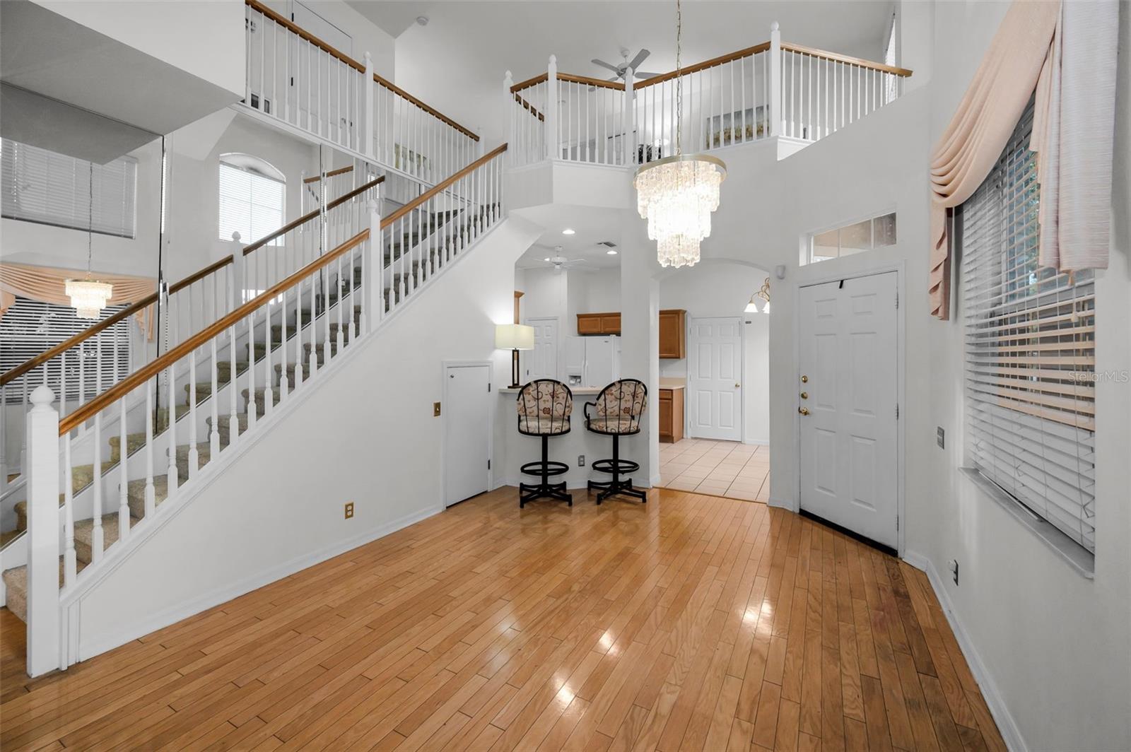 stairway to loft and additional bedrooms