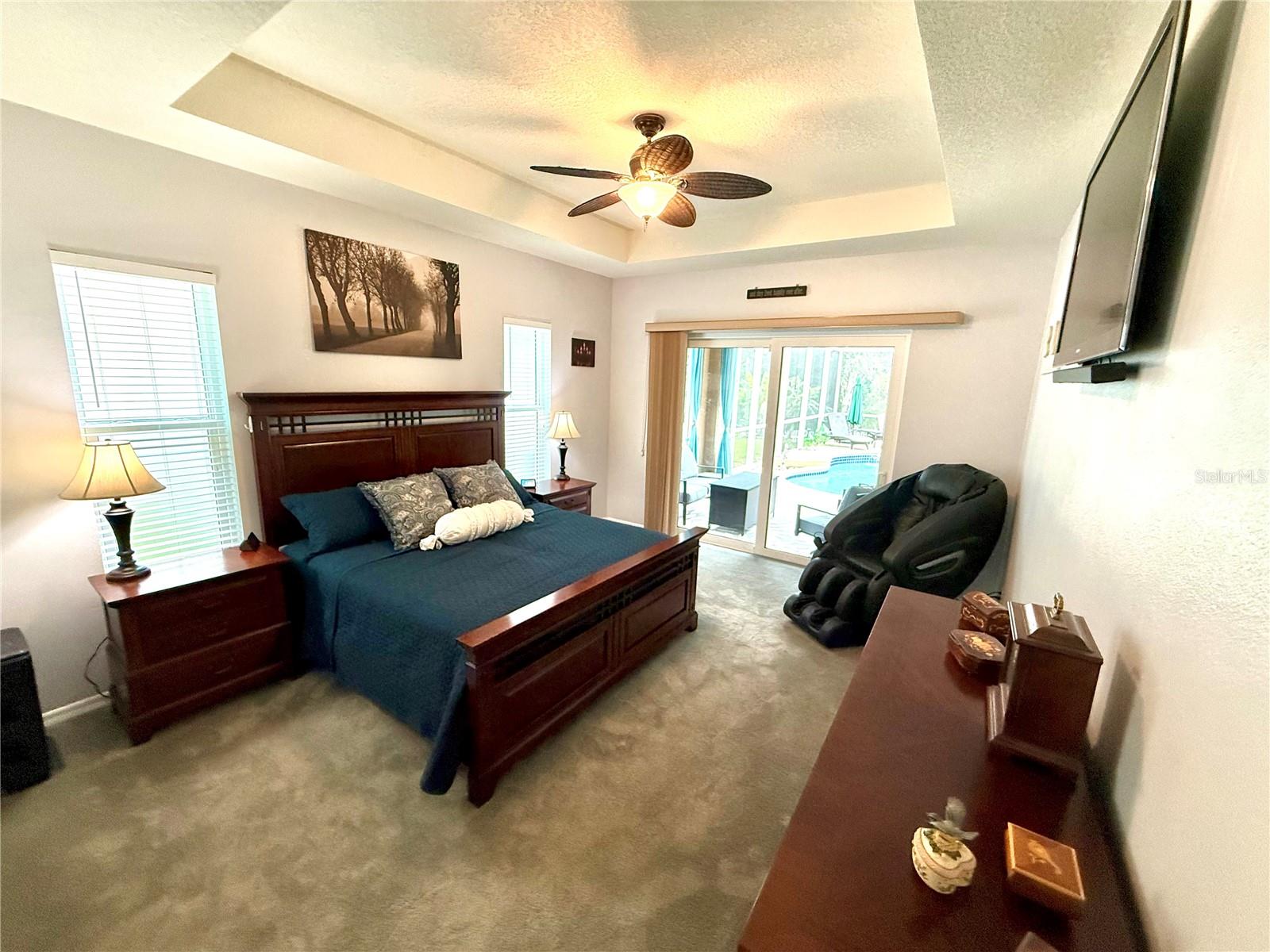 Primary bedroom with access to outdoor sitting area