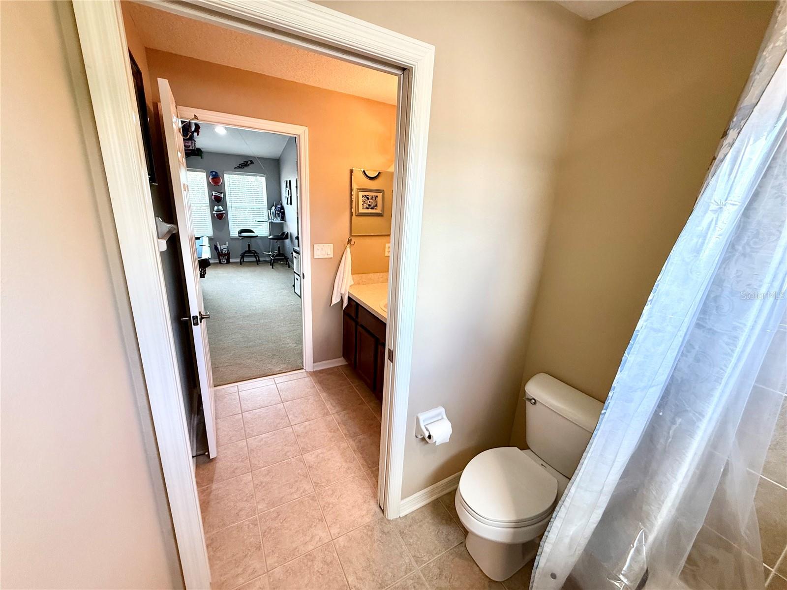 1 of 2 upstairs baths with separate sink area