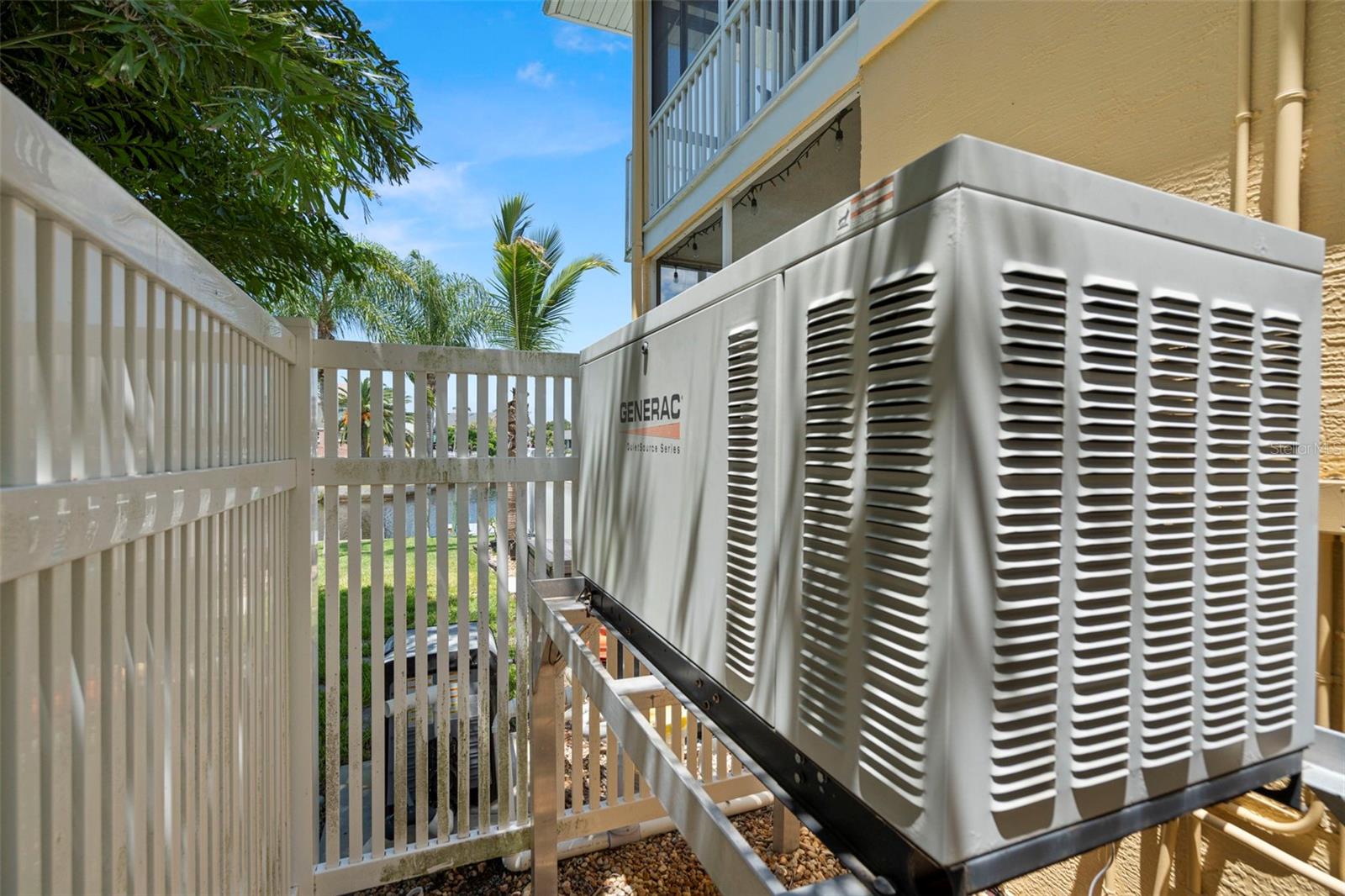 Generac generator - hidden with fence