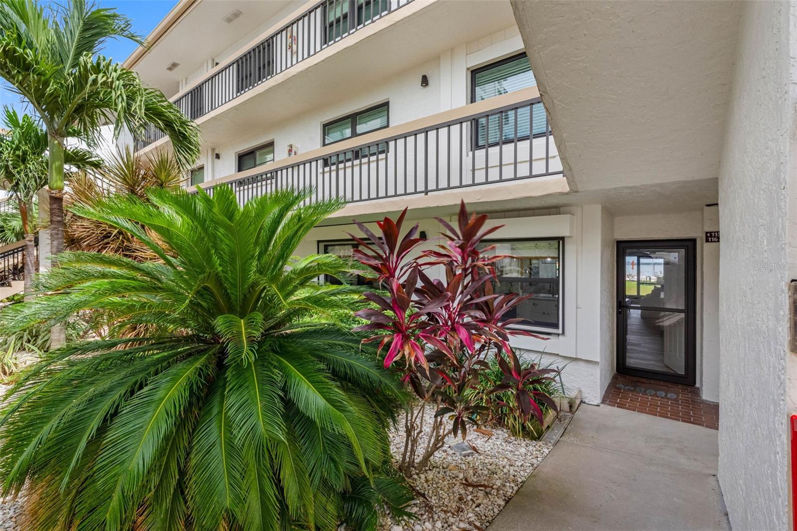 First-Floor Waterfront Luxury with Pool & Bay Views No elevator needed!