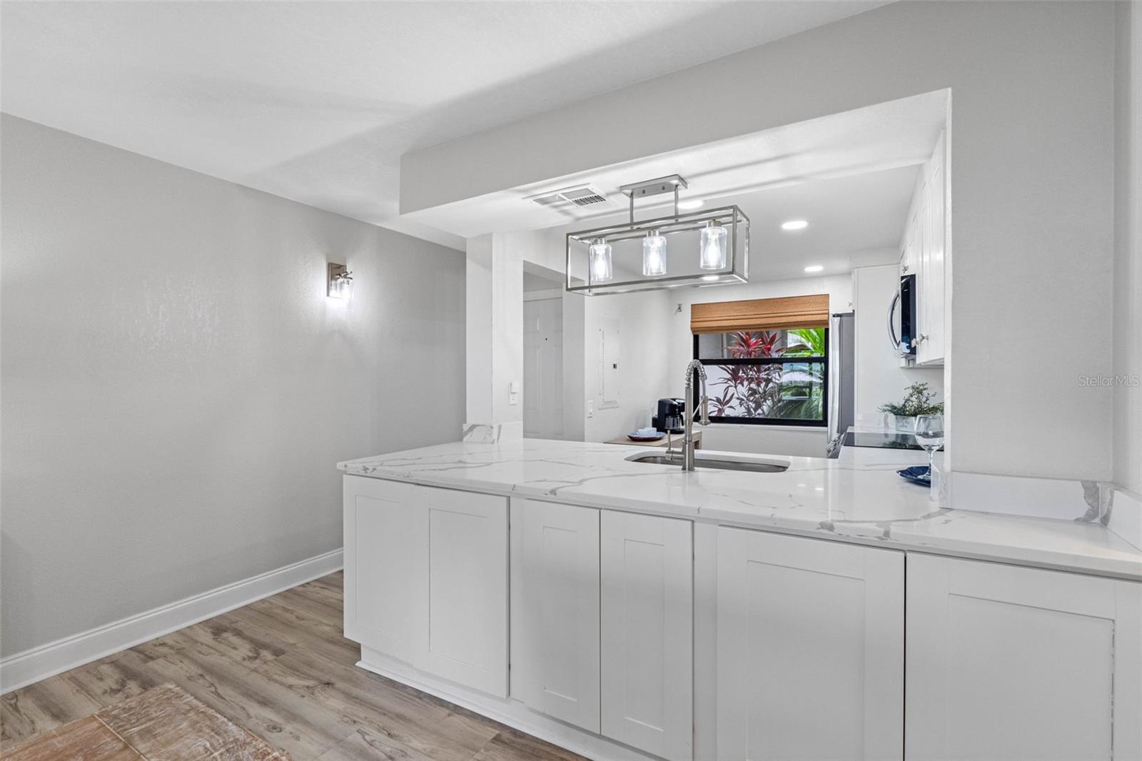 Smooth Ceilings, High-Quality Flooring, and Solid-Core Doors