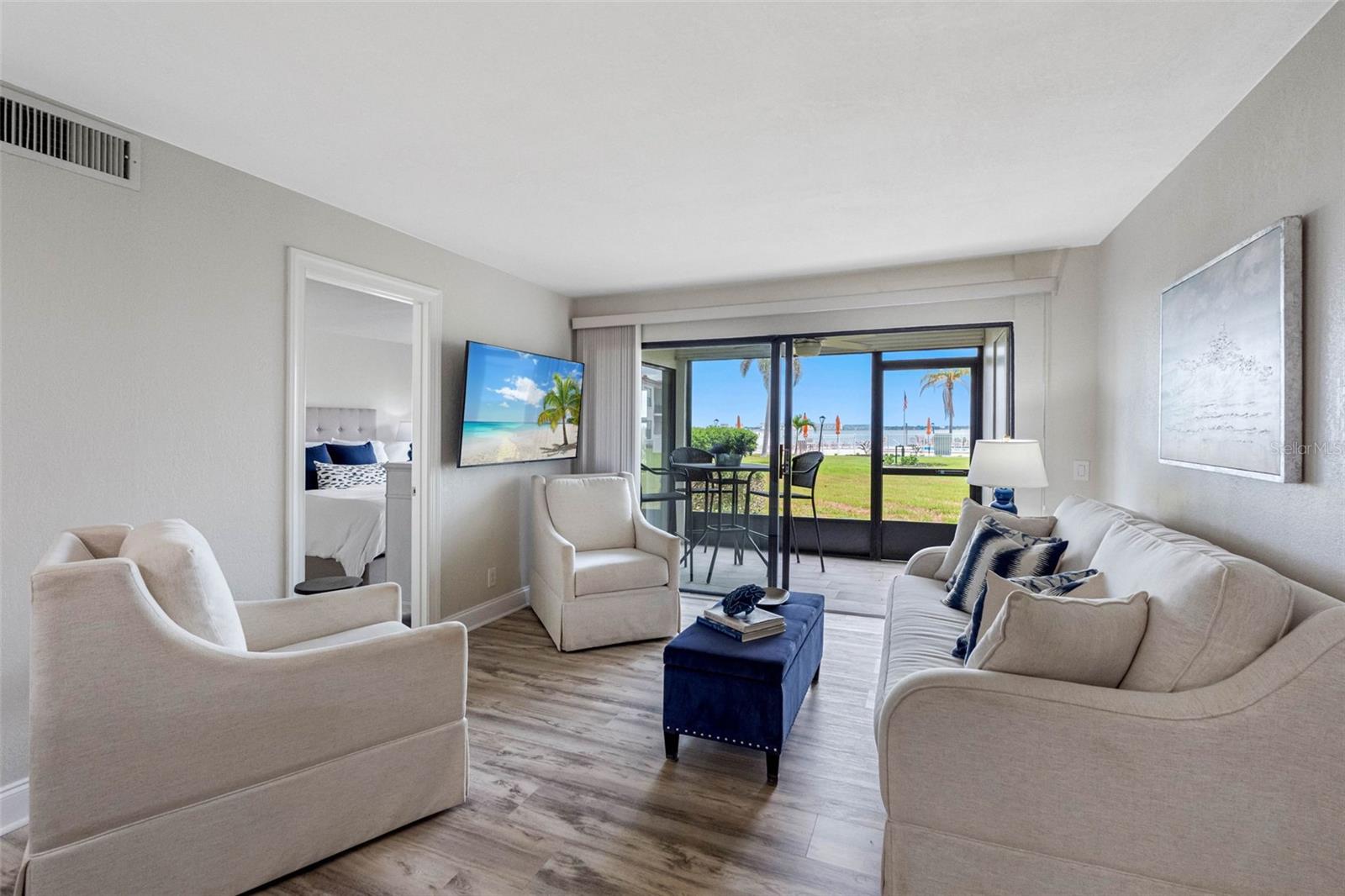 Sliders Fill the Space with Natural Light & Water Views