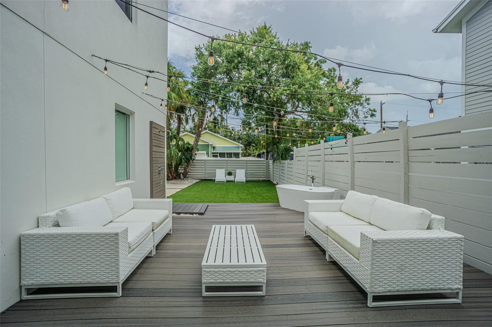 Patio with shower and tub