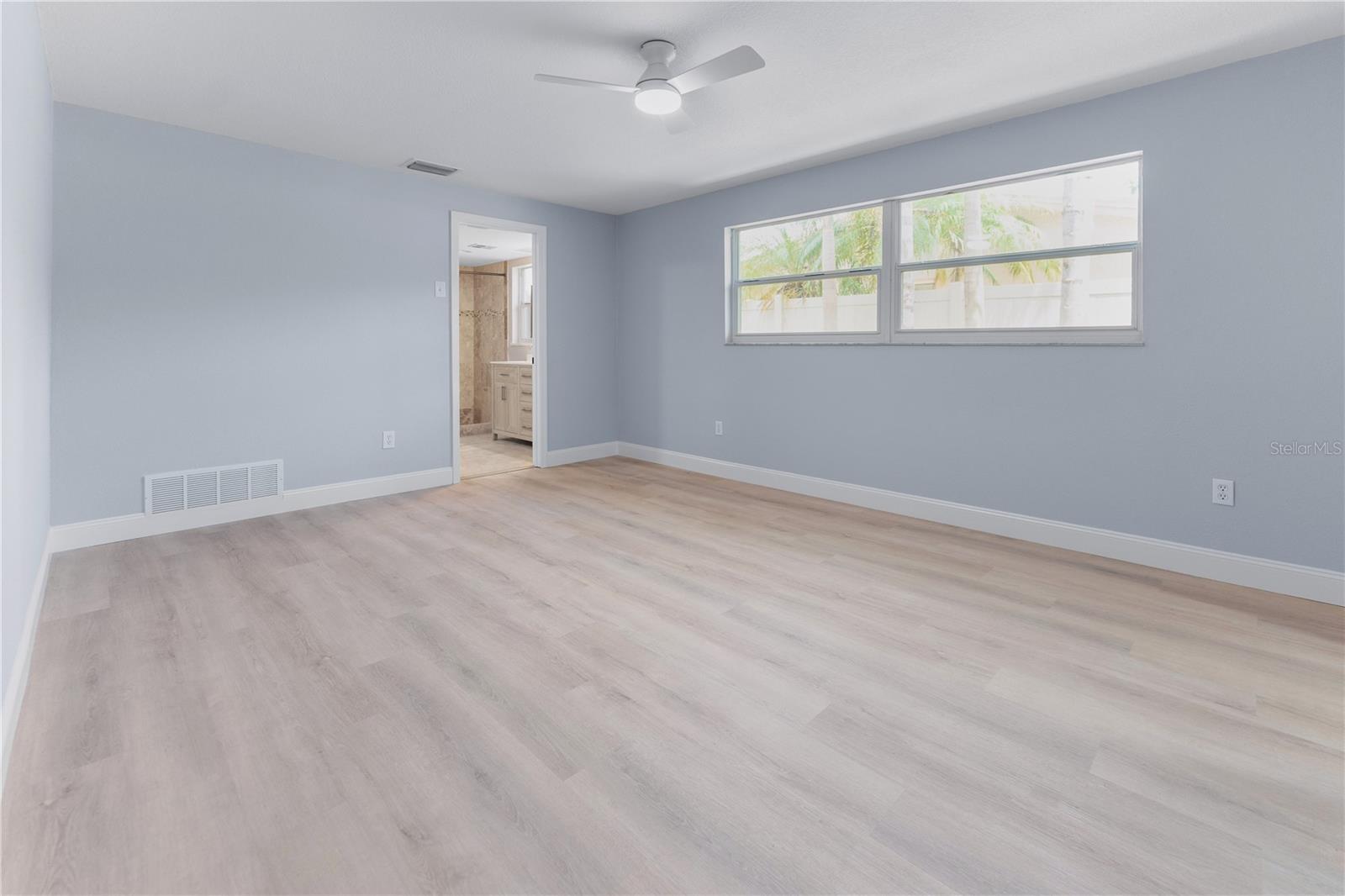 Primary Bedroom with walk-in closet on en-suite