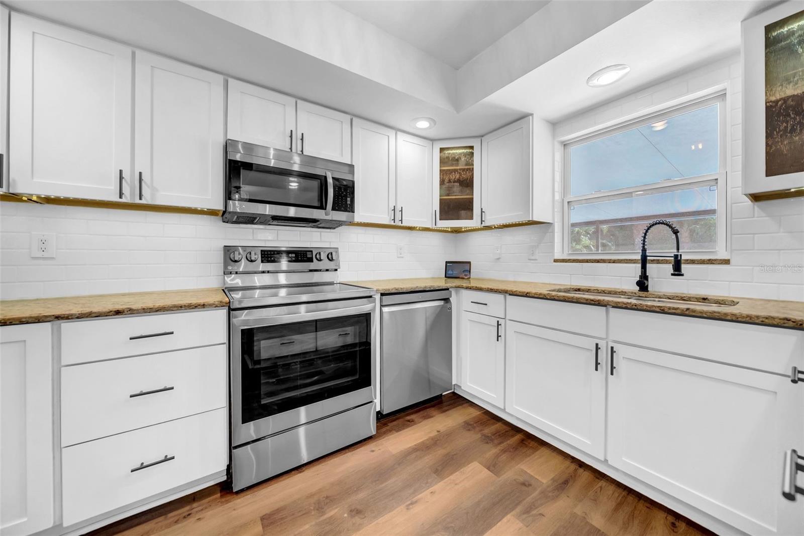 Plenty of counter space with an island and extra storage