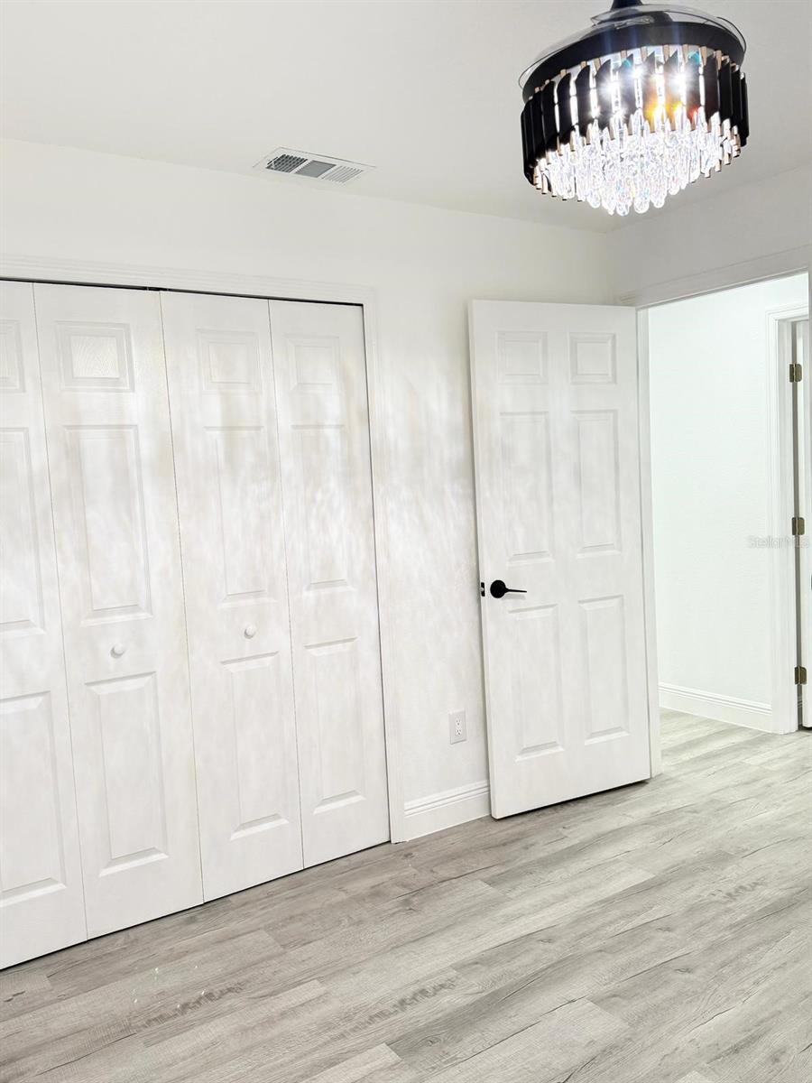 Bedroom 3 with closet view