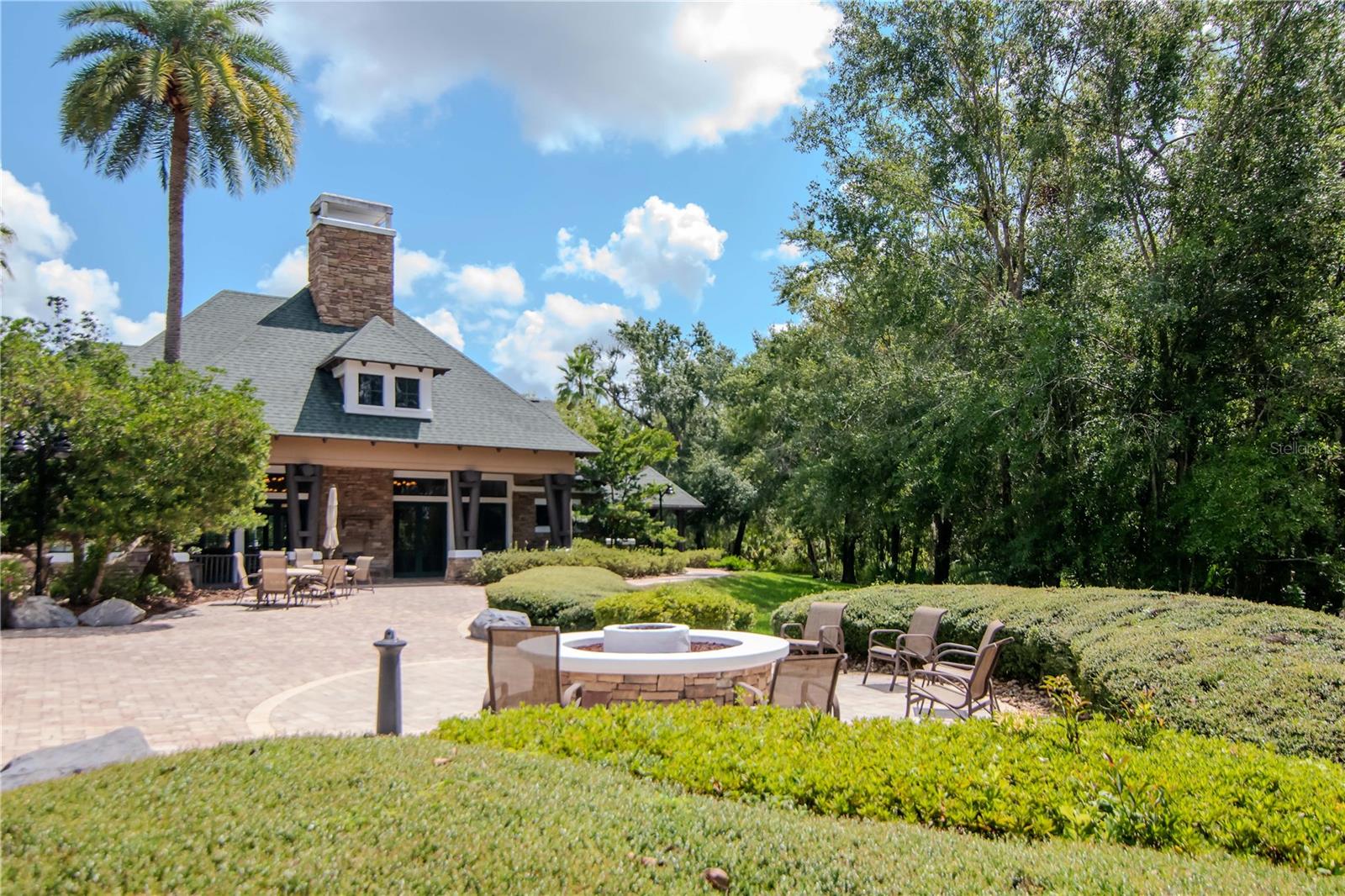 View of WLP Lodge in Back with Firepit, Access to Resort Style Pools, Waterfront & More